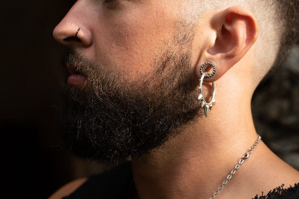Stainless steel tunnels silver colour - Dotted Halo on model wearing earrings
