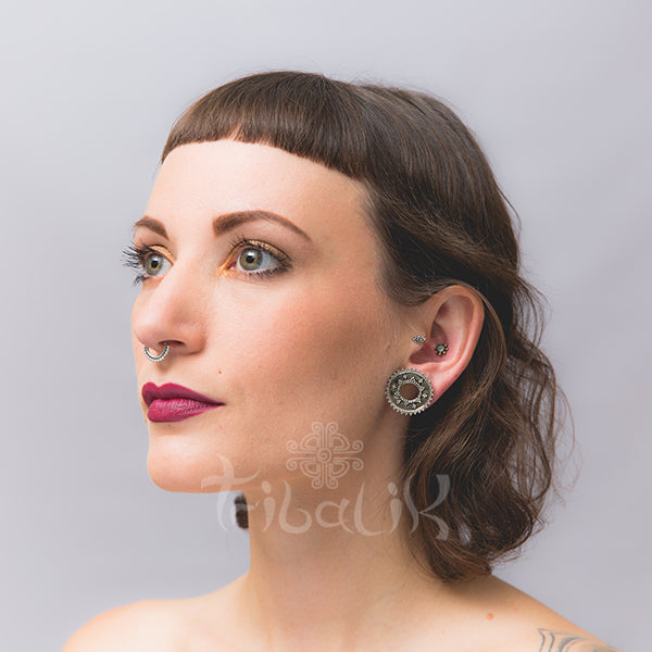 white bronze ear tunnel