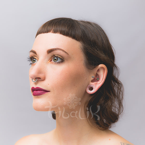 Model wearing Rose Quartz Ear Tunnel/Eyelet