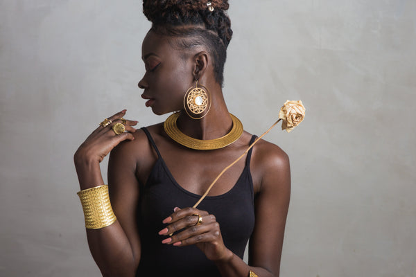 Woman wearing Tribalik Gold Jewellery Collection