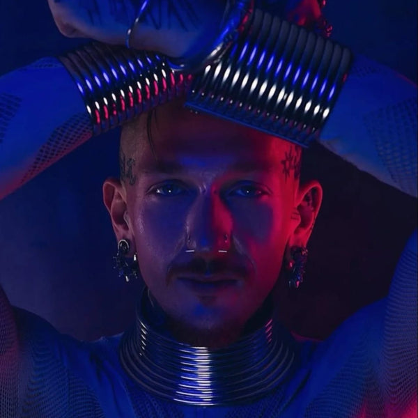 model wearing white brass spiky ear weights