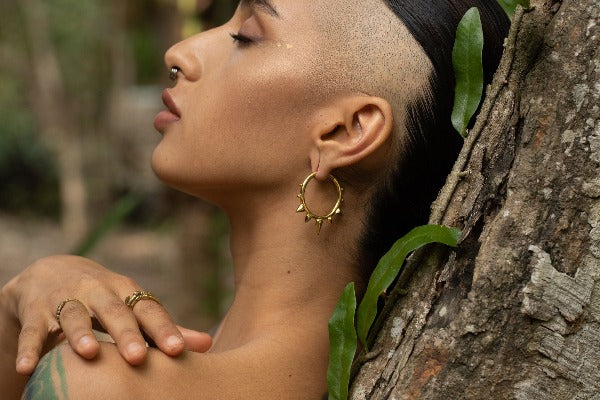 22k yellow gold plated brass clicker earrings - ear weights - Ceremony with spikes on model with stretched ears