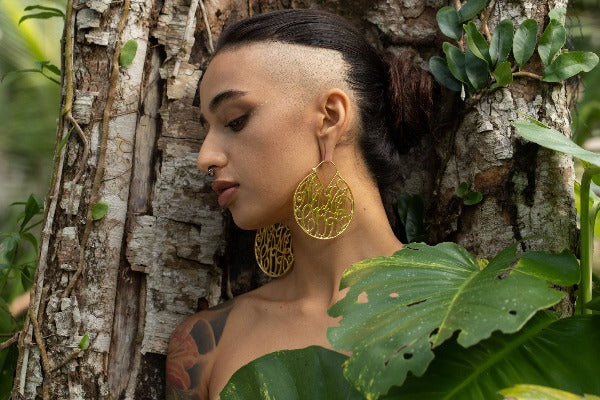 22k yellow gold plated brass earrings - ear weights - Mamacita on model with stretched ears