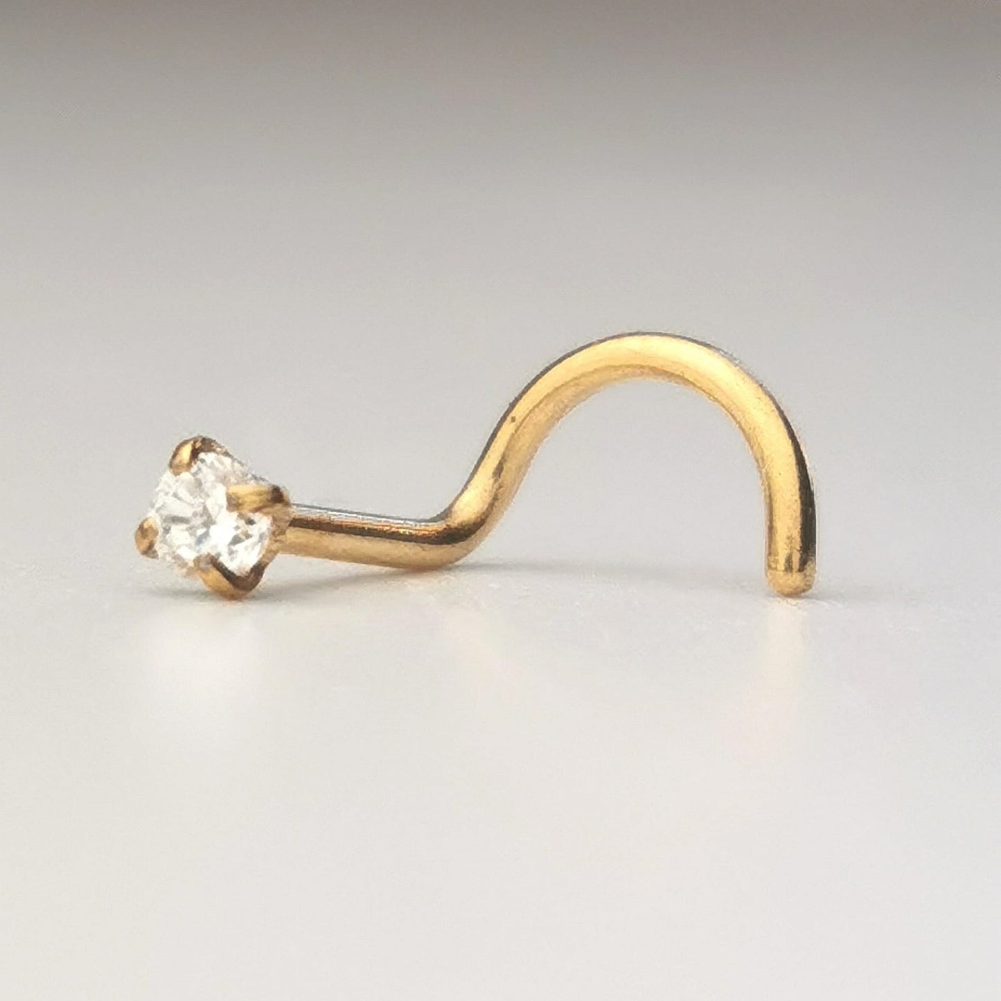 gold nose stud corkscrew