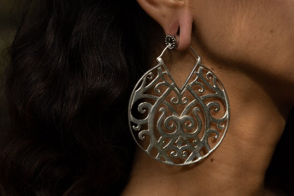 Silver plated brass earrings - ear weights - Monastery on model wearing tunnels