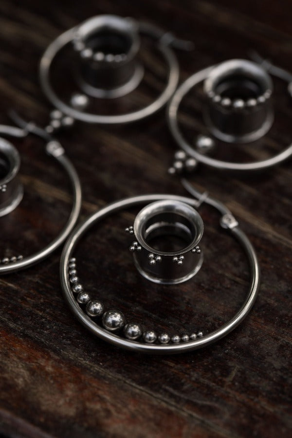 Stainless steel hoop earrings with balls - Newtons Cradle with stainless steel tunnels