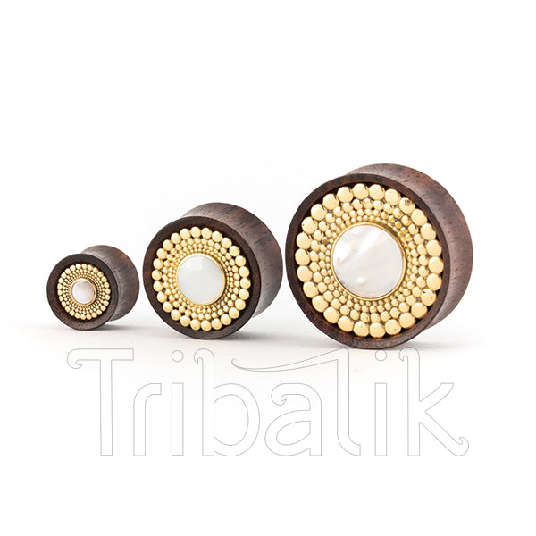 wood and gold ear plugs